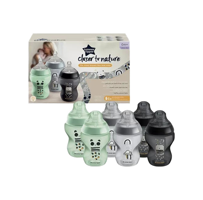 Set of baby bottles with packaging labeled 'Tommee Tippee closer to nature' - MamaApp