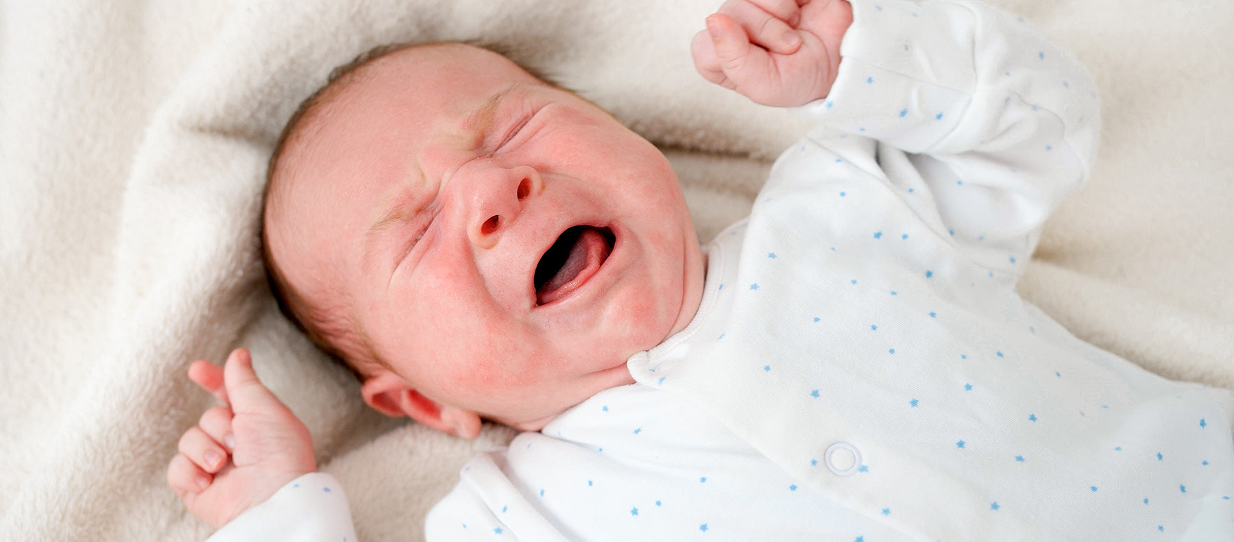 أسباب بكاء طفلي الرضيع
